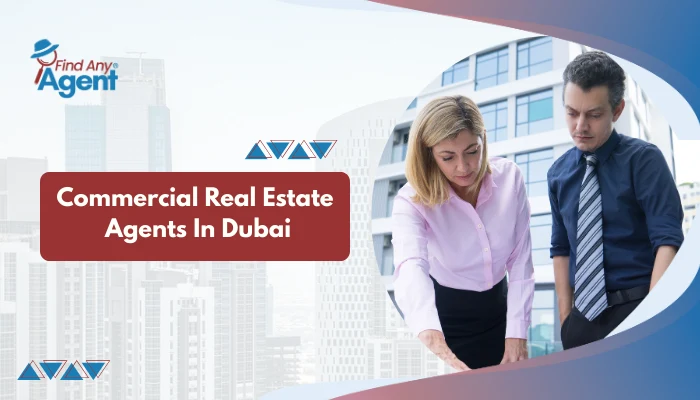 A professional web banner for FindAnyAgent titled "Commercial Real Estate Agents in Dubai" featuring a male and female consultant working together in a high-rise office.