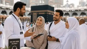 How to Perform Umrah – A Complete Step-by-Step Guide for Pilgrims 8 Findanyagent trusted travel agency guide showing an agent helping Umrah pilgrims near the Kaaba.