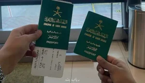 Findanyagent Saudi Arabia visa assistance guide showing two Saudi passports and a flight boarding pass held up at an airport.